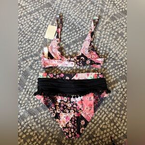 Tularosa women’s 2 piece tie knot top and Pom Pom bottom Black and Pink Floral